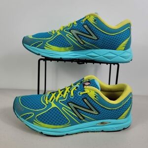 New Balance Revlite WR1400bg women’s running shoes blue light blue yellow Sz 7